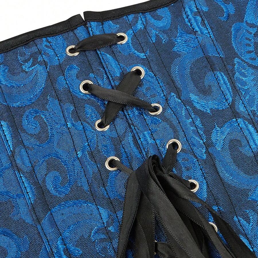 Vintage lace-up waist trainer corset with grommet eyelet details and plant pattern, designed for Halloween styling.