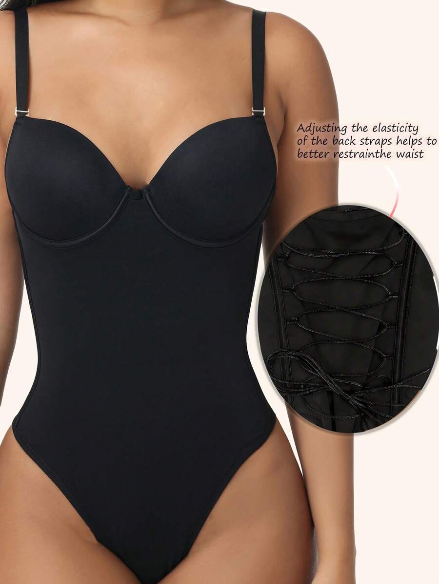 Black shapewear bodysuit for women featuring a built-in push-up bra, back tie, zipper closure, and Bermuda shorts length.