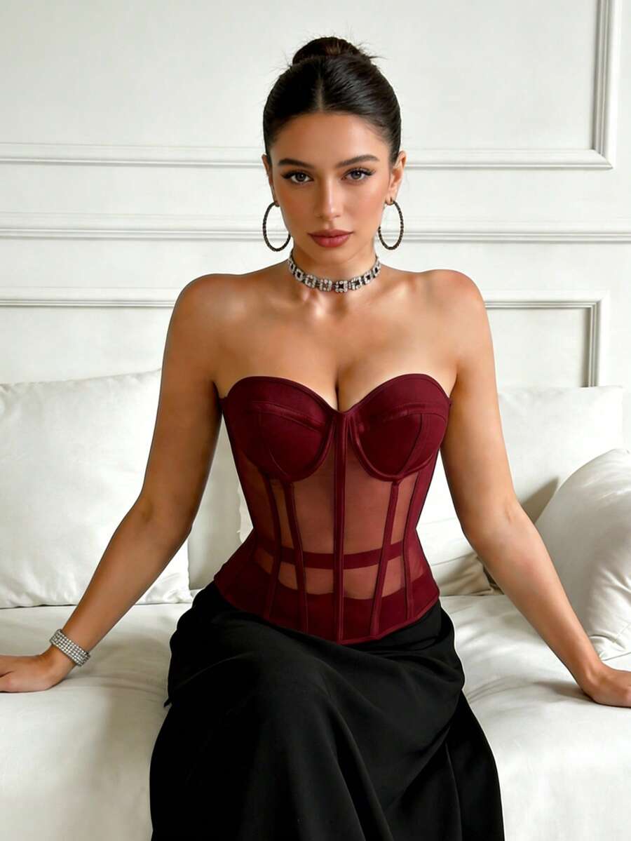 Beige strapless sheer mesh corset top for women featuring front boning, lace-up grommet eyelet detail, and push-up padded cups.