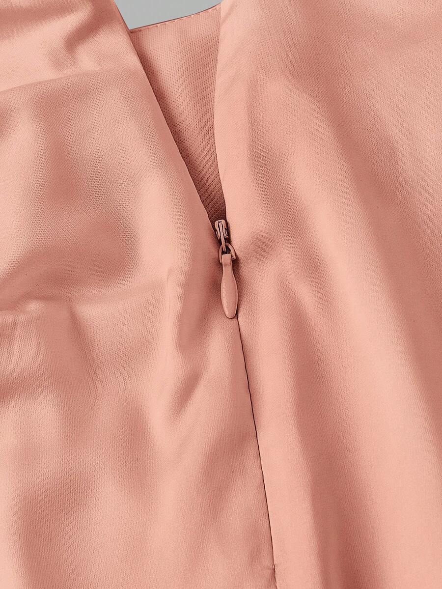 Women's elegant pink satin asymmetrical long skirt featuring contrast lace patchwork, ruched knot detailing, and a mid-waist mermaid cut.