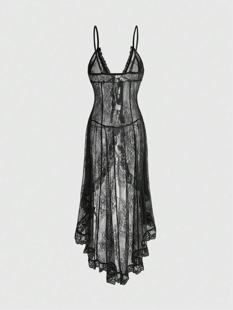 Woman wearing a black sheer lace maxi dress with spaghetti straps, high waist split thigh, and asymmetrical hem.