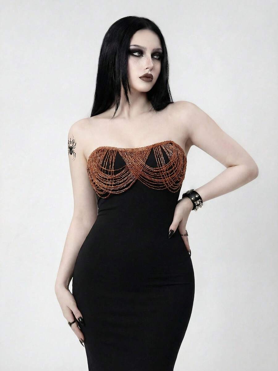 Black strapless bodycon maxi dress featuring a backless design, split thigh, and matching long arm sleeves.
