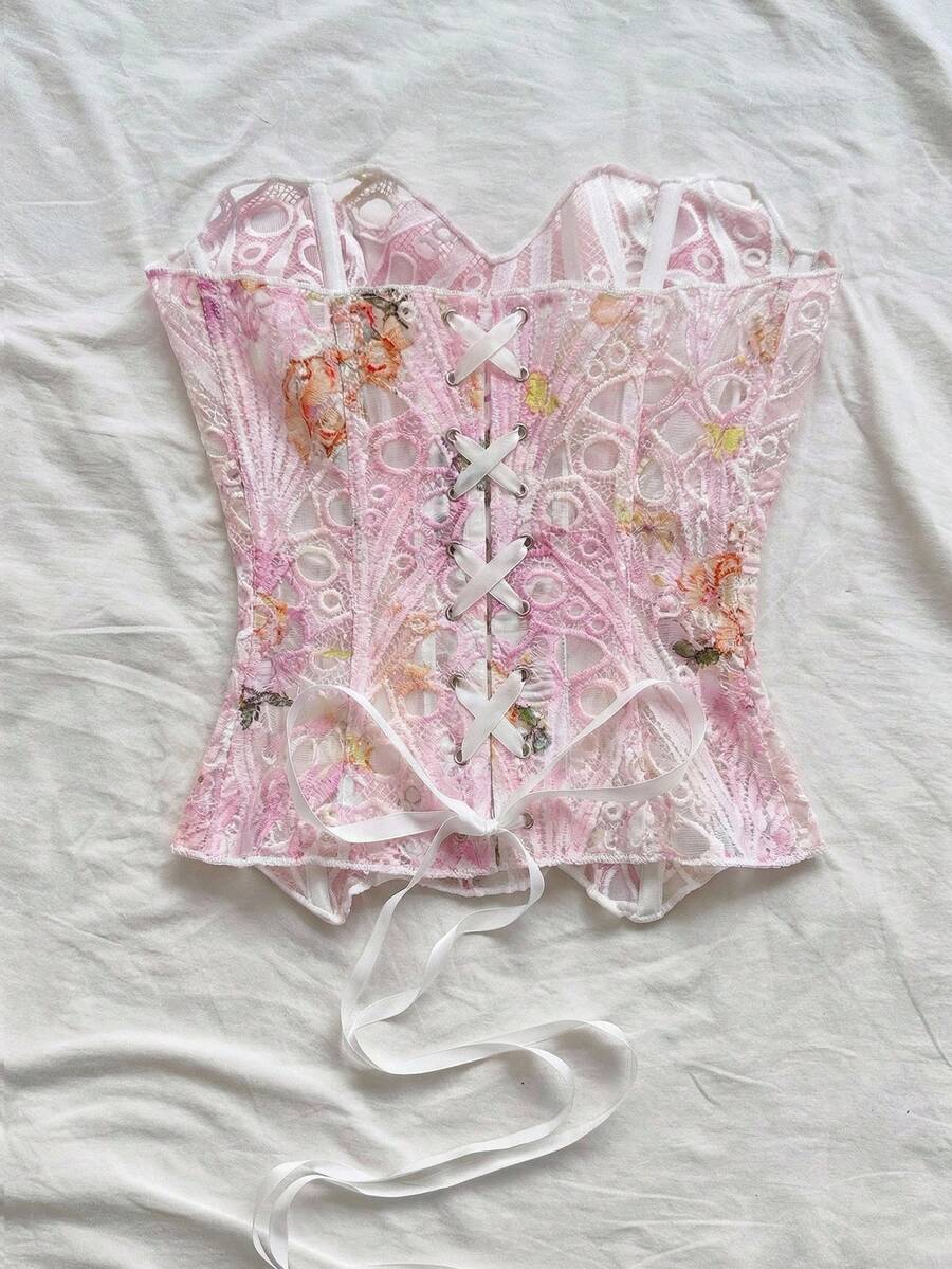 Strapless floral lace corset top with lace-up detail, asymmetrical hem, and slim fit for women.
