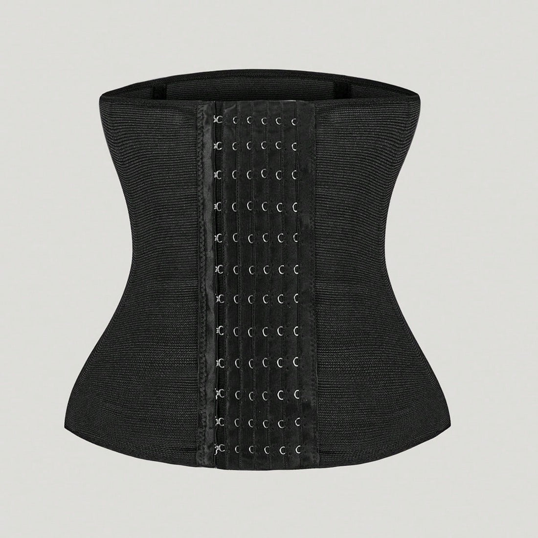 Black women's waist-cinching shaping belt with adjustable multi-row buckle closure and high-stretch fabric.