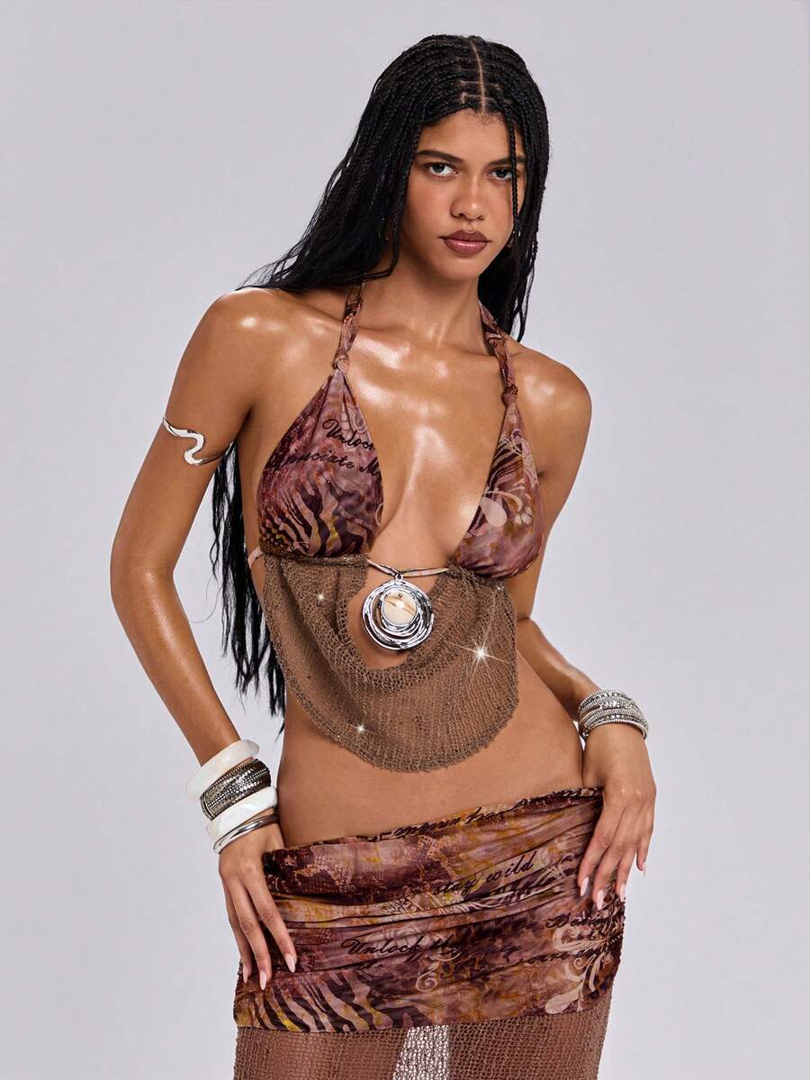 Multicolor knitted halter crop top featuring floral and zebra stripe pattern with draped neck, 3D rose detail, asymmetrical hem, and matching separate arm sleeves.