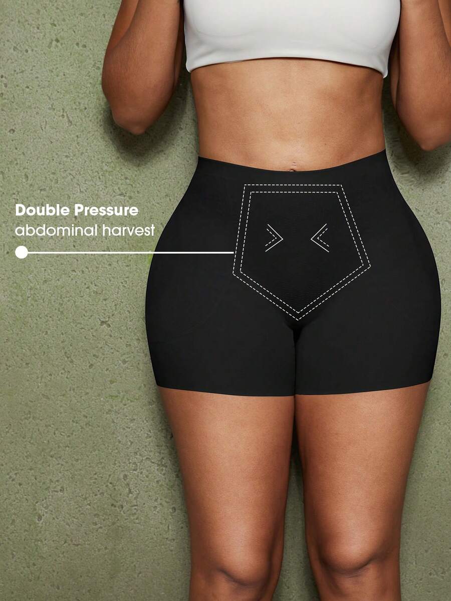 Women's black seamless waist trainer shorts featuring tummy control and butt lifting pads