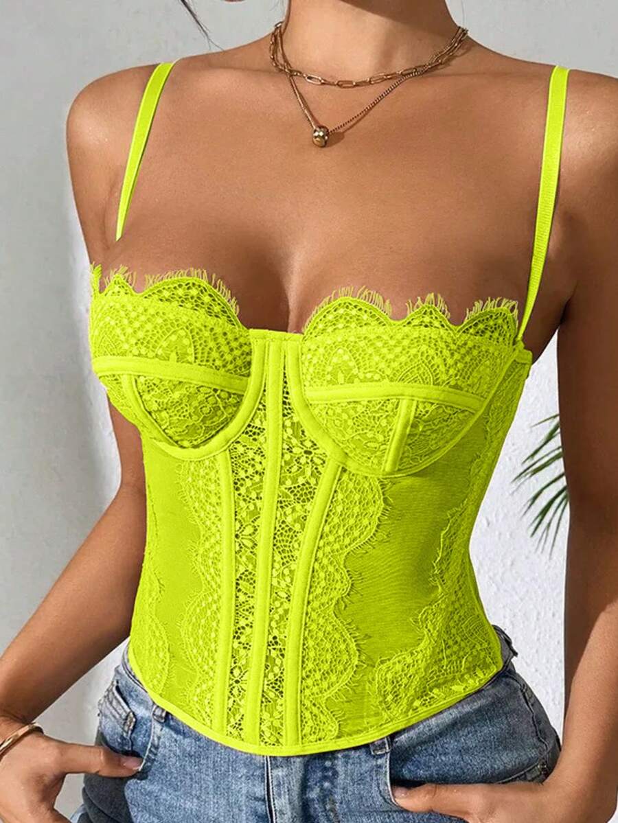 Black lace bustier corset top for women with buckle detail, spaghetti straps, slim fit, and lightweight mesh fabric for a night out look.