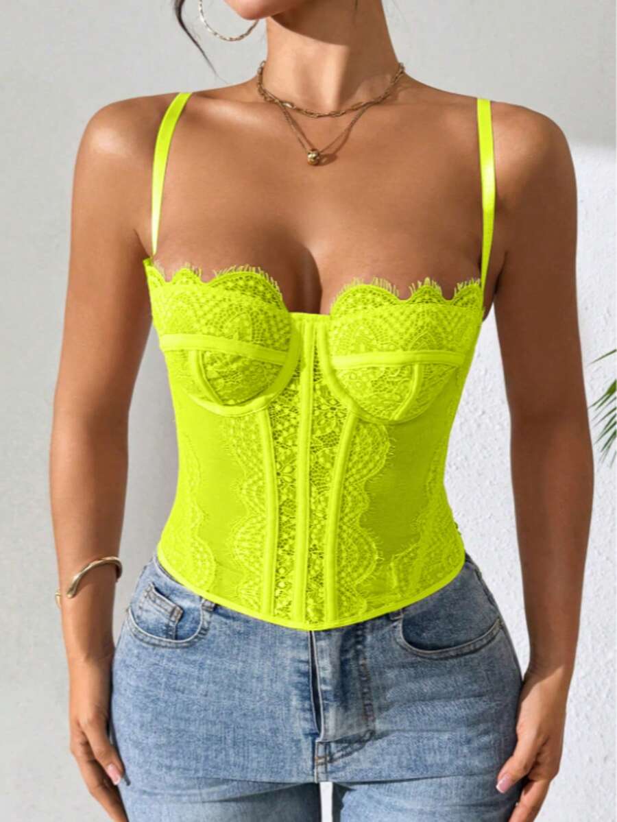 Black lace bustier corset top for women with buckle detail, spaghetti straps, slim fit, and lightweight mesh fabric for a night out look.