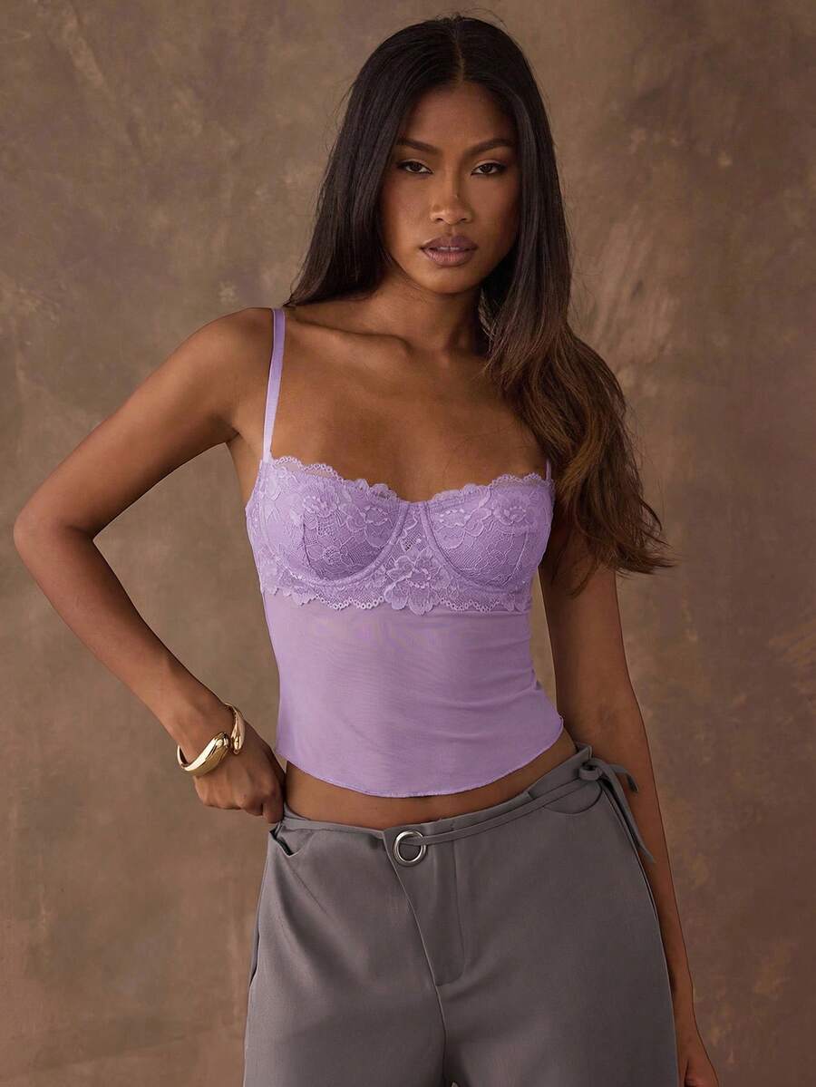 Women's black contrast lace camisole with spaghetti straps, cup detail, semi-sheer finish, and slim fit for going out or date night.