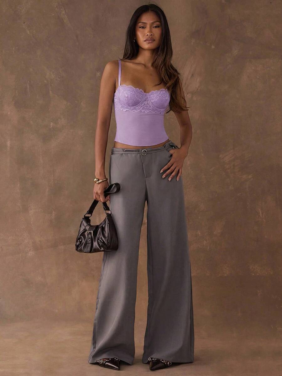 Women's black contrast lace camisole with spaghetti straps, cup detail, semi-sheer finish, and slim fit for going out or date night.