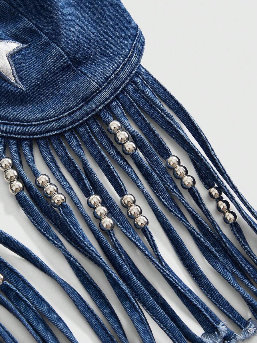 Blue denim camisole top for women featuring star patch detailing, fringe tassel asymmetrical hem, and spaghetti straps.