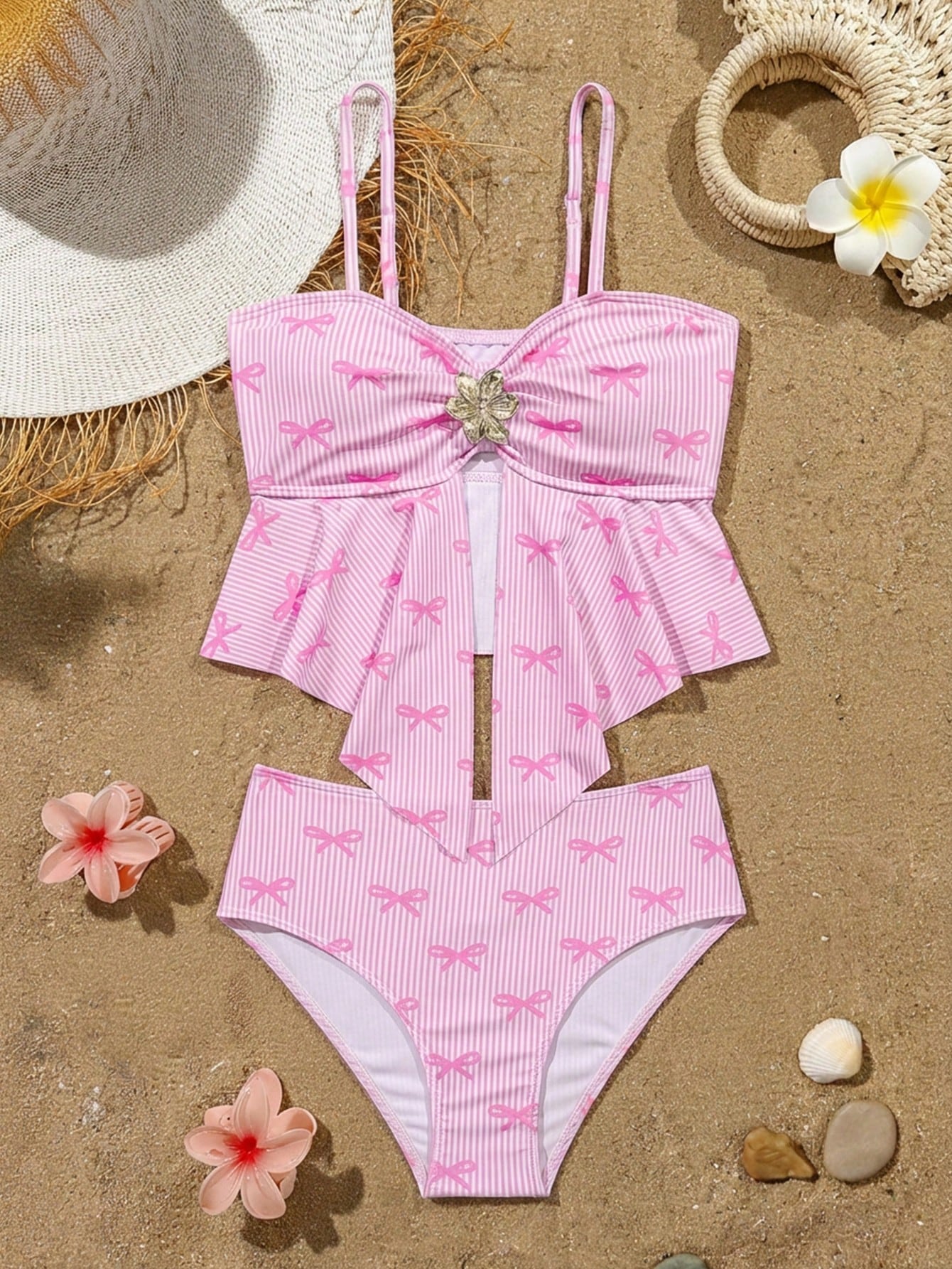 Tween girls two-piece tankini swimwear set with spaghetti straps, asymmetrical design, and 3D rose detail. Features a plant-pattern top and mid-waist bottoms in stretchy fabric for beach or pool wear.
