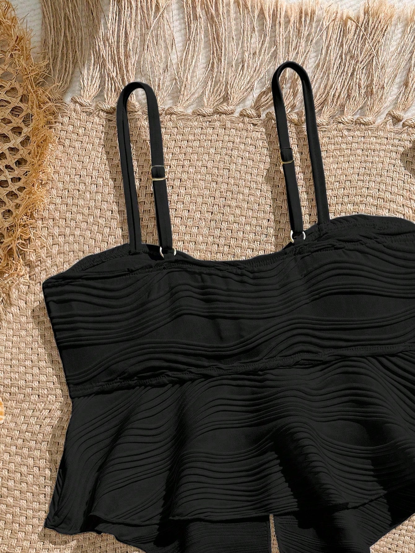Tween girls two-piece tankini swimwear set with spaghetti straps, asymmetrical design, and 3D rose detail. Features a plant-pattern top and mid-waist bottoms in stretchy fabric for beach or pool wear.