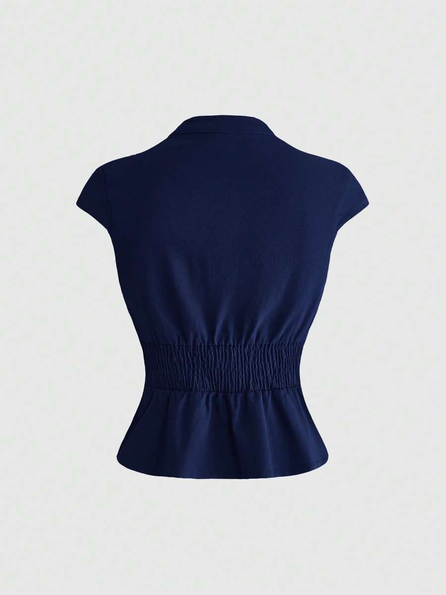 Women's black deep V-neck top featuring cap sleeves, cut-out lace-up details, zipper closure, and regular fit woven fabric.