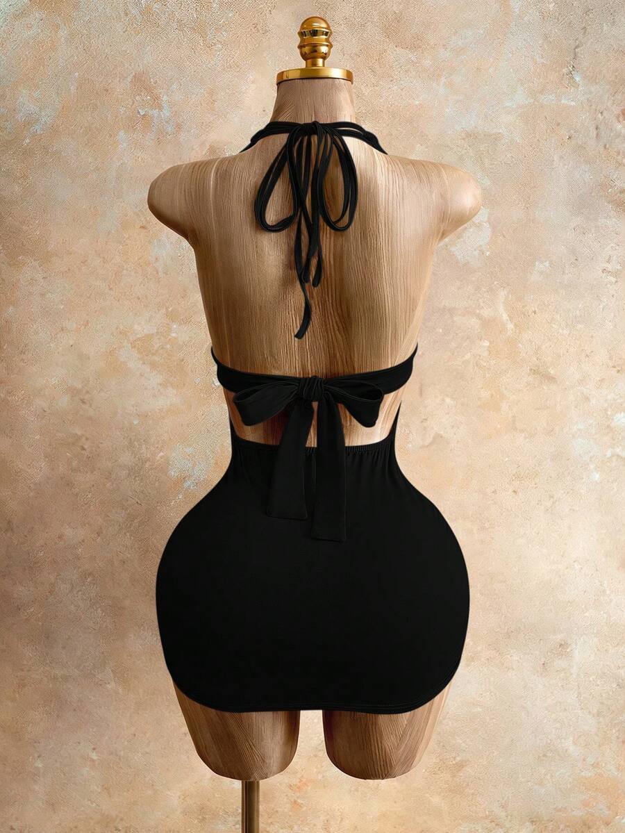 Sleeveless women's halter backless bodycon mini dress featuring lace-up knot back details and a high-waist pencil hem.