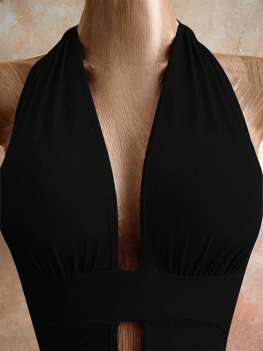 Sleeveless women's halter backless bodycon mini dress featuring lace-up knot back details and a high-waist pencil hem.