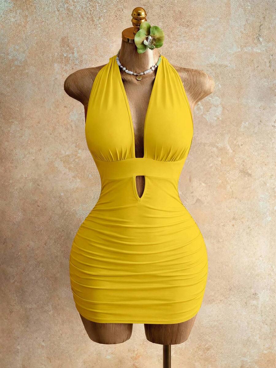 Sleeveless women's halter backless bodycon mini dress featuring lace-up knot back details and a high-waist pencil hem.