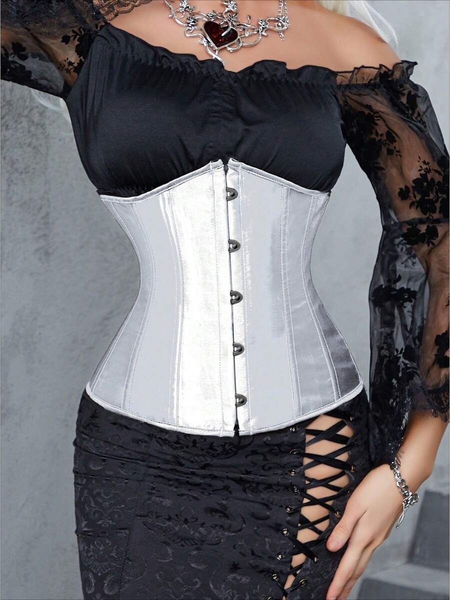 Vintage lace-up waist trainer corset with grommet eyelet details and plant pattern, designed for Halloween styling.