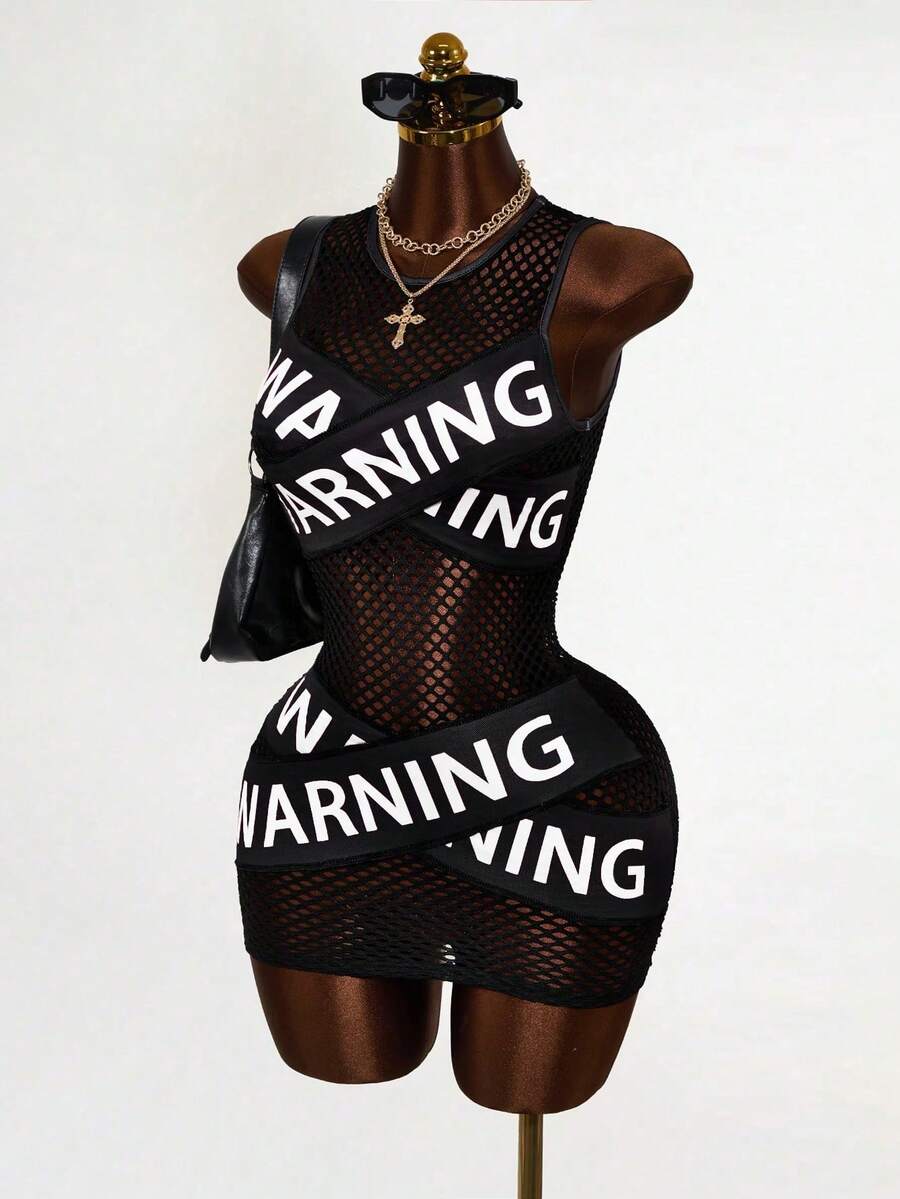Women's black sheer mesh bodycon mini dress featuring slogan graphic print, round neckline, cut-out pointelle details, and a sleeveless slim fit pencil silhouette.