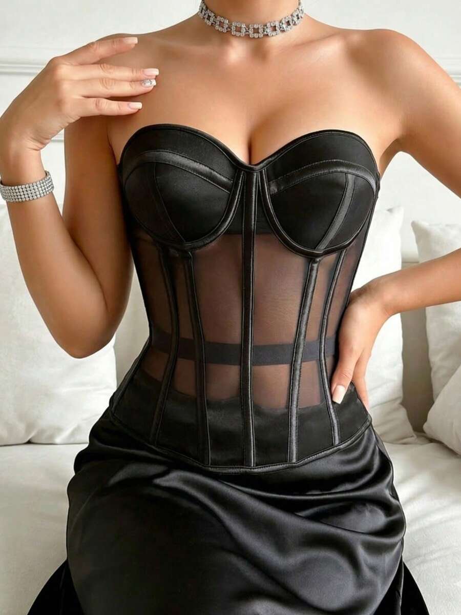 Beige strapless sheer mesh corset top for women featuring front boning, lace-up grommet eyelet detail, and push-up padded cups.