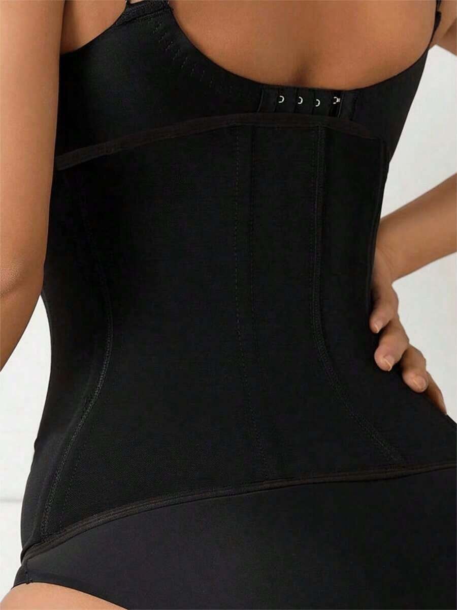Women's black mesh waist cincher corset shapewear with a structured design for a sleek fitted look.