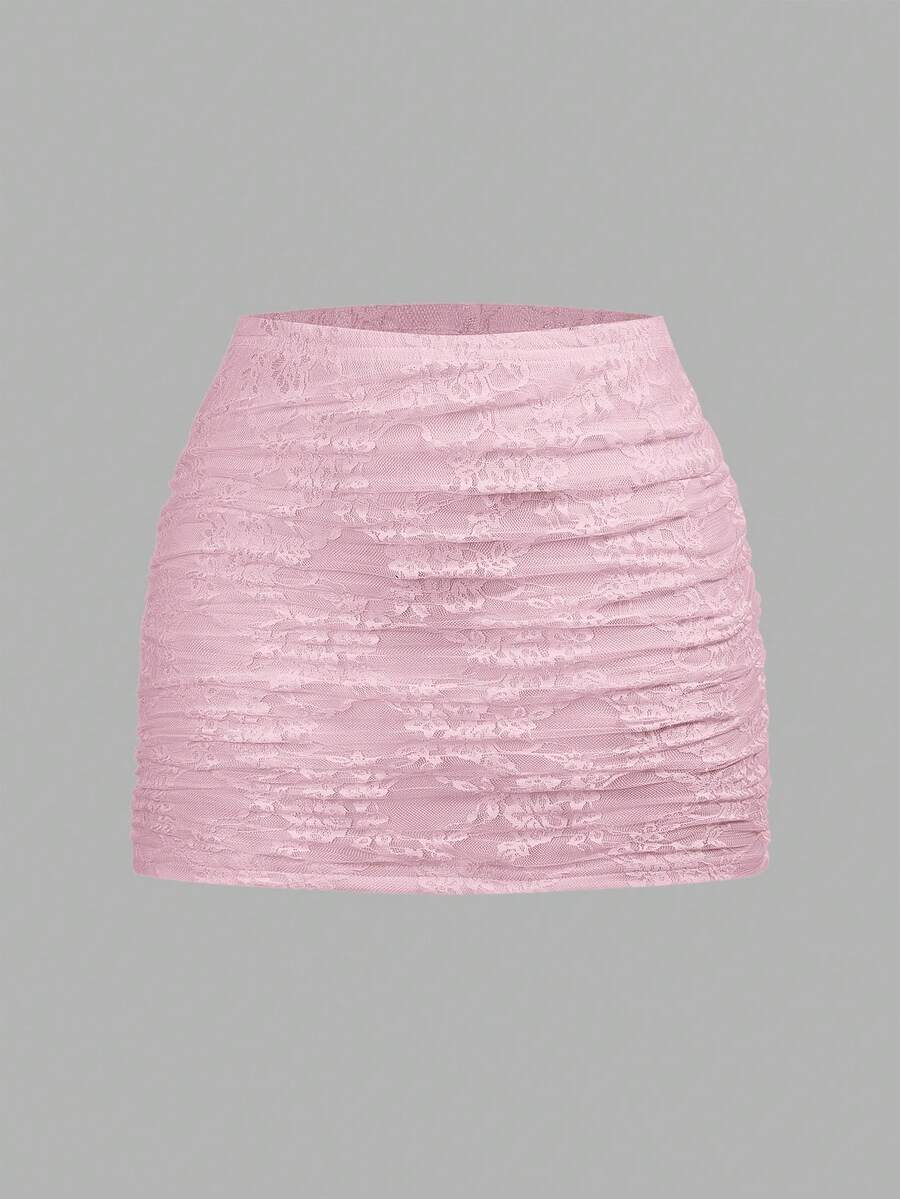 Women's black floral lace mini skirt featuring a ruched bodycon design, mid waist, and high stretch lined fabric.