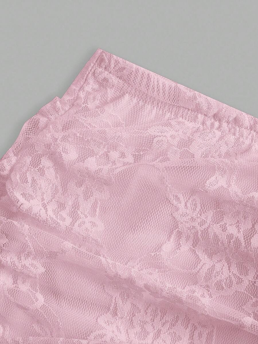 Women's black floral lace mini skirt featuring a ruched bodycon design, mid waist, and high stretch lined fabric.
