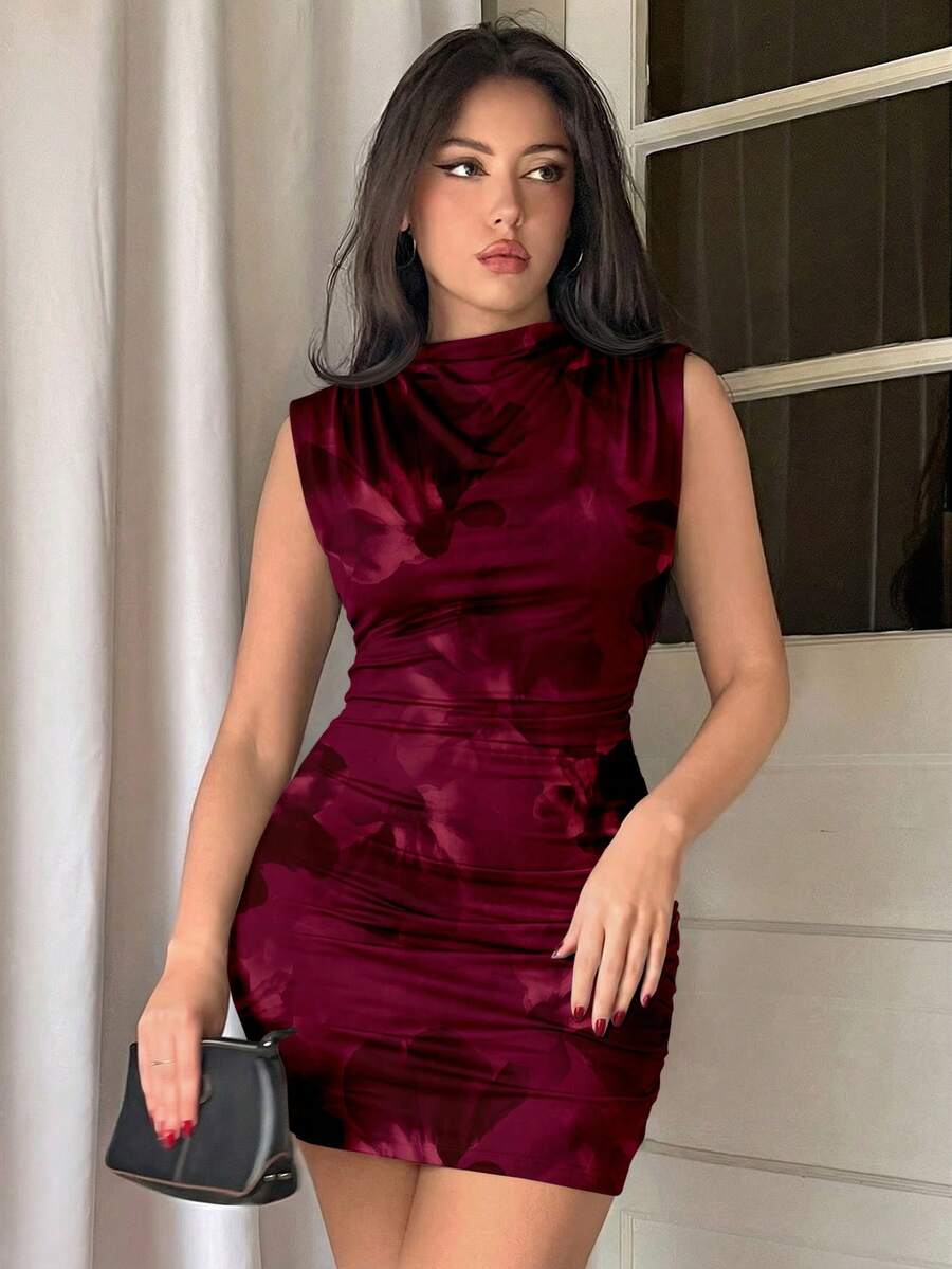 Army green sleeveless bodycon mini dress with a stand collar, ruched details, and zipper back.