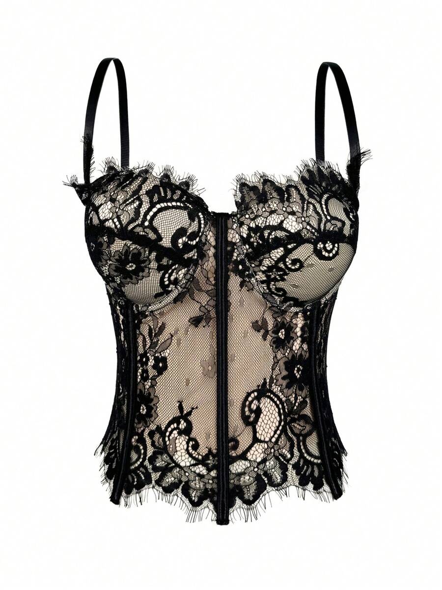 Black women's shaping cami with contrast lace, spaghetti straps, asymmetrical hem, lined body, and slim fit for casual and night-out styling.