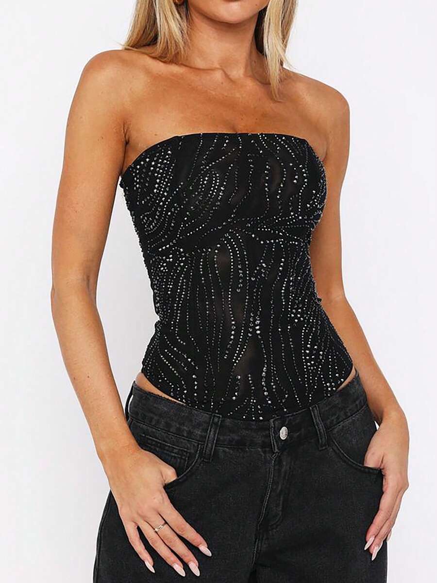 Black strapless corset tube top with sparkling rhinestone decor, boned silhouette, and lace-up tie back.