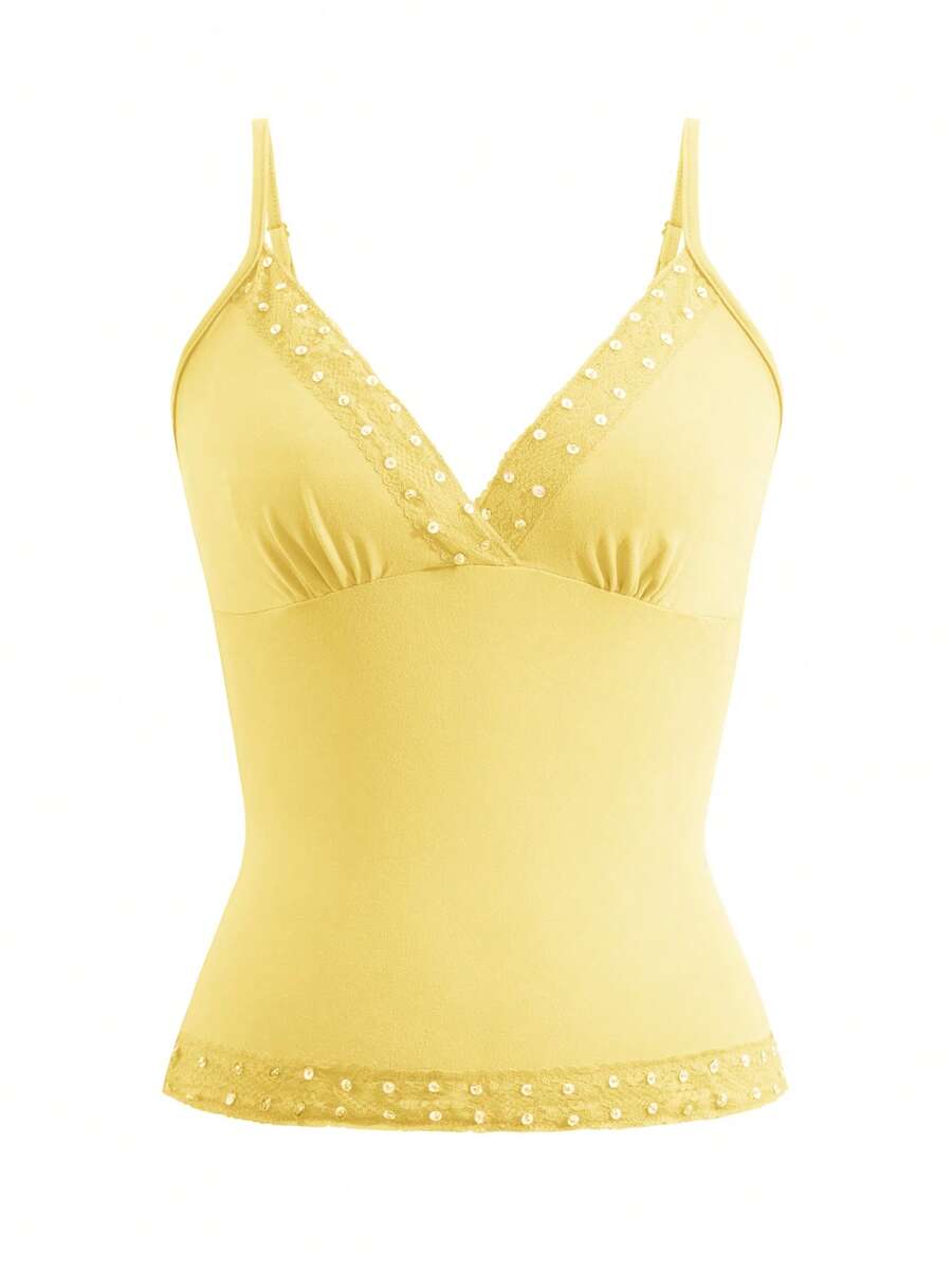 Women's deep V-neck camisole top featuring contrast hollow lace trim, cutout detail, and thin spaghetti straps.