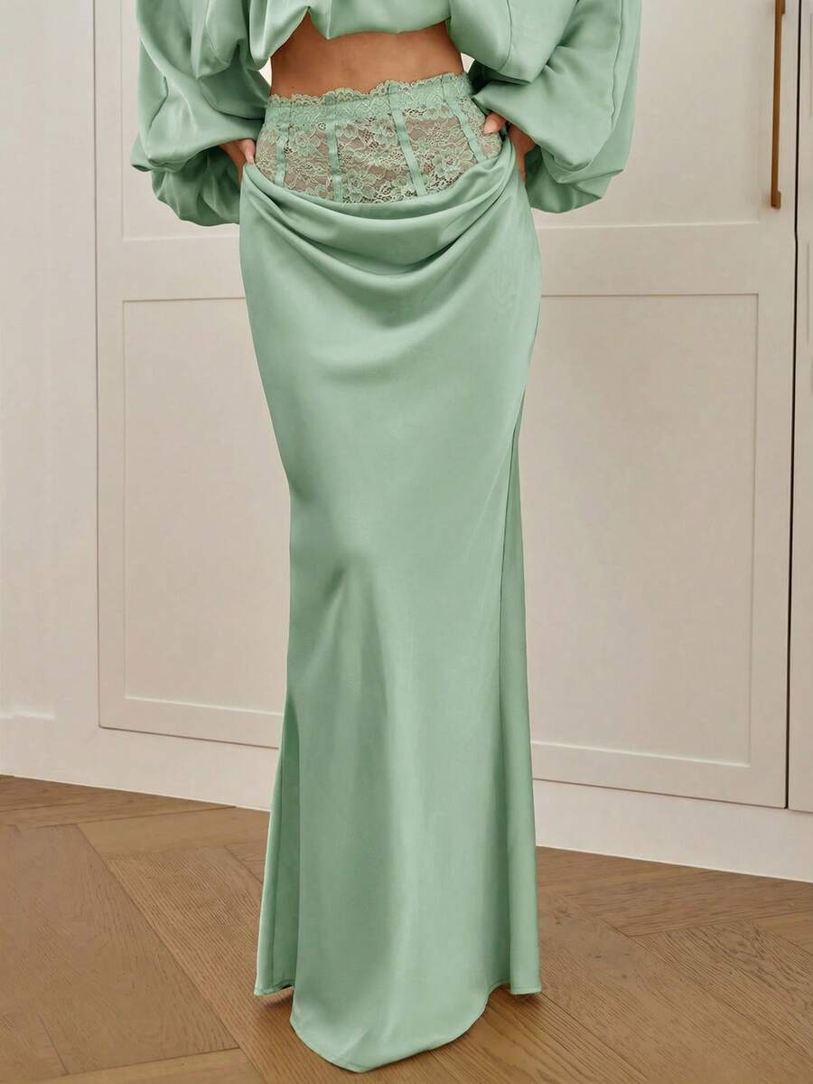 Women's high waist satin mermaid maxi skirt featuring contrast lace patchwork embroidery detail and side slit for formal and evening wear.