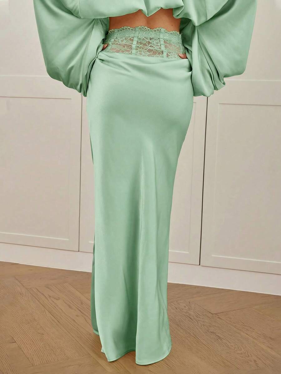 Women's high waist satin mermaid maxi skirt featuring contrast lace patchwork embroidery detail and side slit for formal and evening wear.