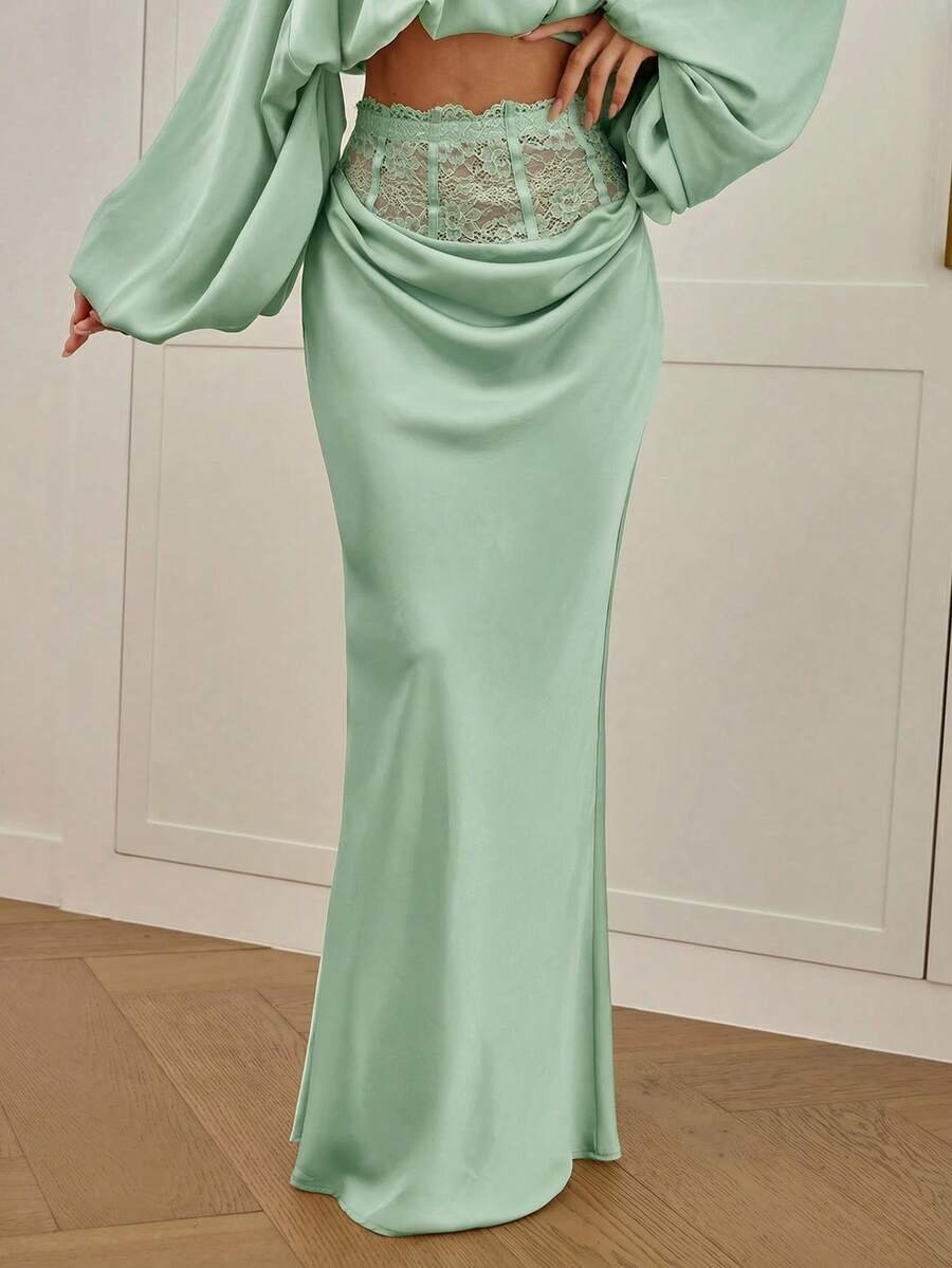 Women's high waist satin mermaid maxi skirt featuring contrast lace patchwork embroidery detail and side slit for formal and evening wear.