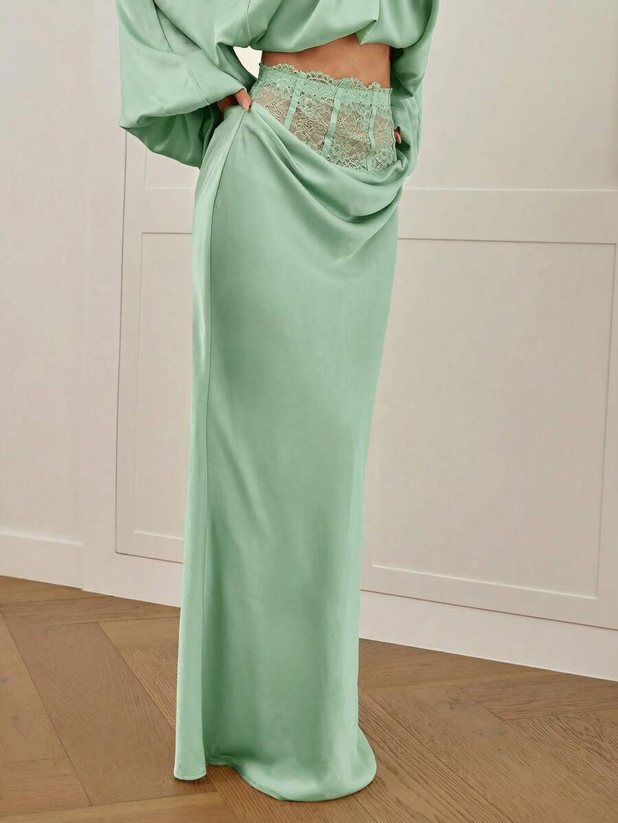 Women's high waist satin mermaid maxi skirt featuring contrast lace patchwork embroidery detail and side slit for formal and evening wear.