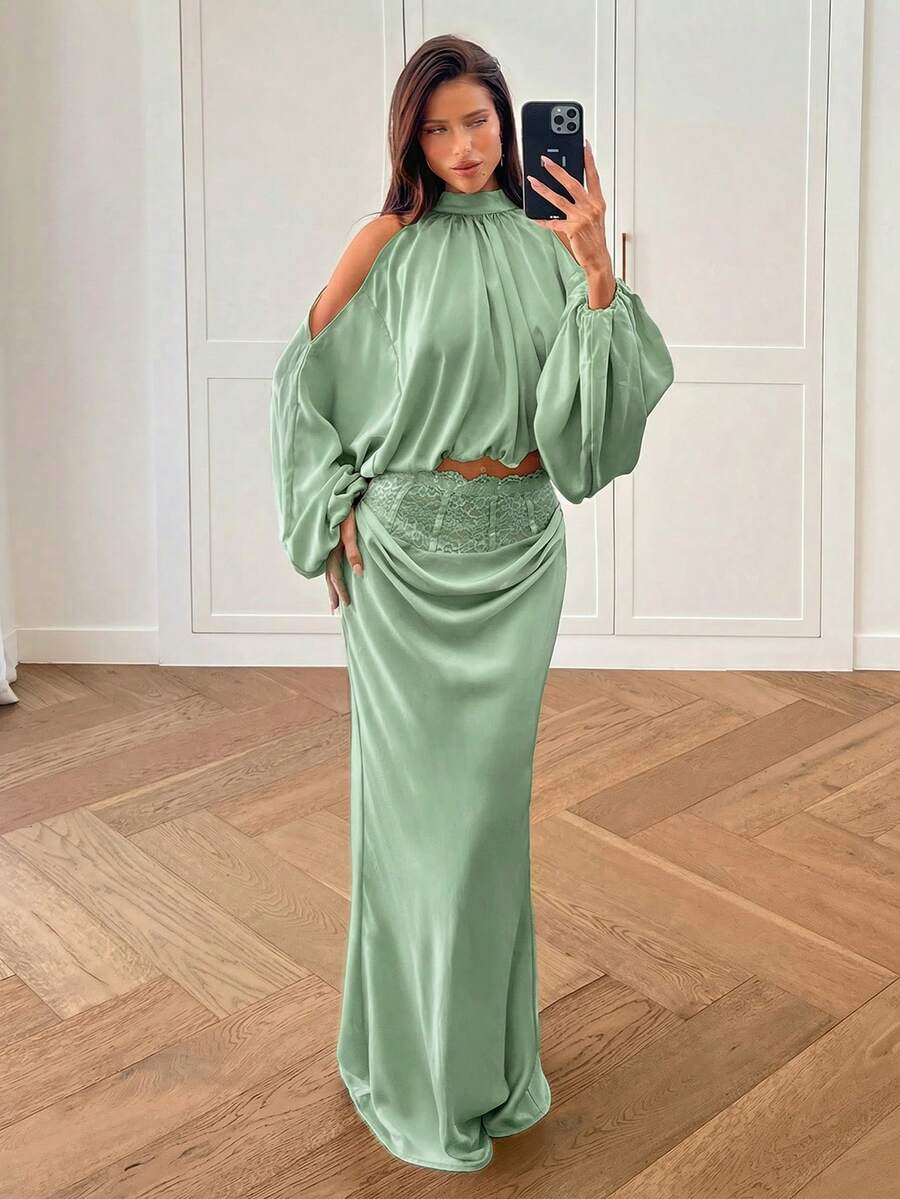 Women's high waist satin mermaid maxi skirt featuring contrast lace patchwork embroidery detail and side slit for formal and evening wear.