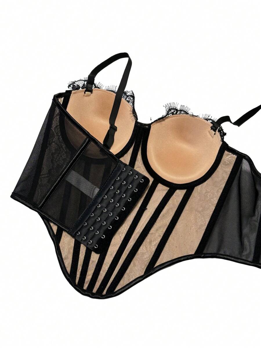 Black women's shaping cami with contrast lace, spaghetti straps, asymmetrical hem, lined body, and slim fit for casual and night-out styling.
