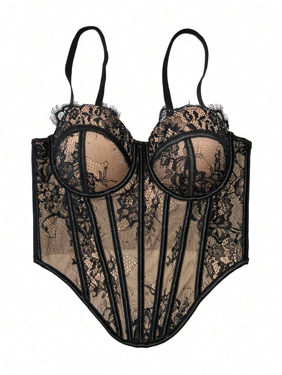 Black women's shaping cami with contrast lace, spaghetti straps, asymmetrical hem, lined body, and slim fit for casual and night-out styling.