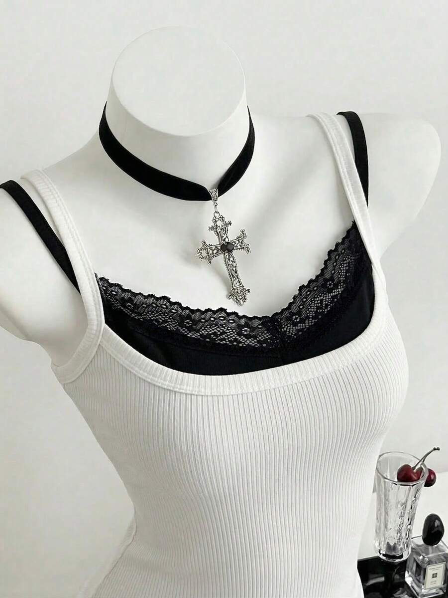 Women's slim fit spaghetti strap cami tank top with contrast lace trim along the neckline