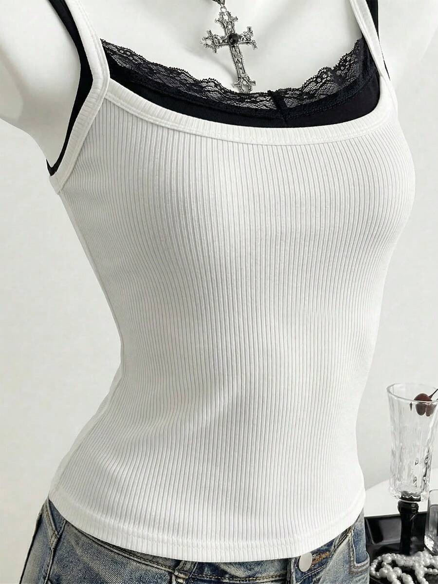 Women's slim fit spaghetti strap cami tank top with contrast lace trim along the neckline