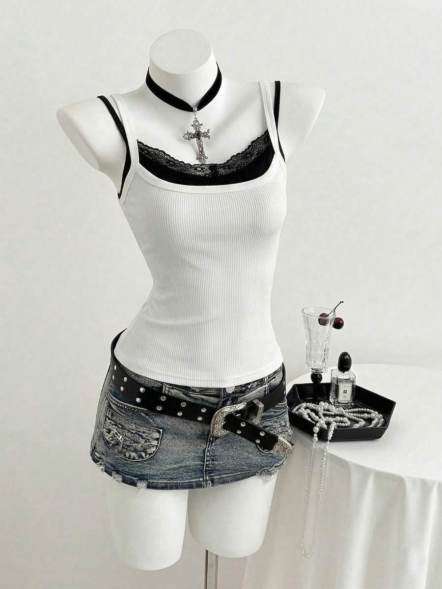 Women's slim fit spaghetti strap cami tank top with contrast lace trim along the neckline