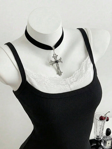 Women's slim fit spaghetti strap cami tank top with contrast lace trim along the neckline