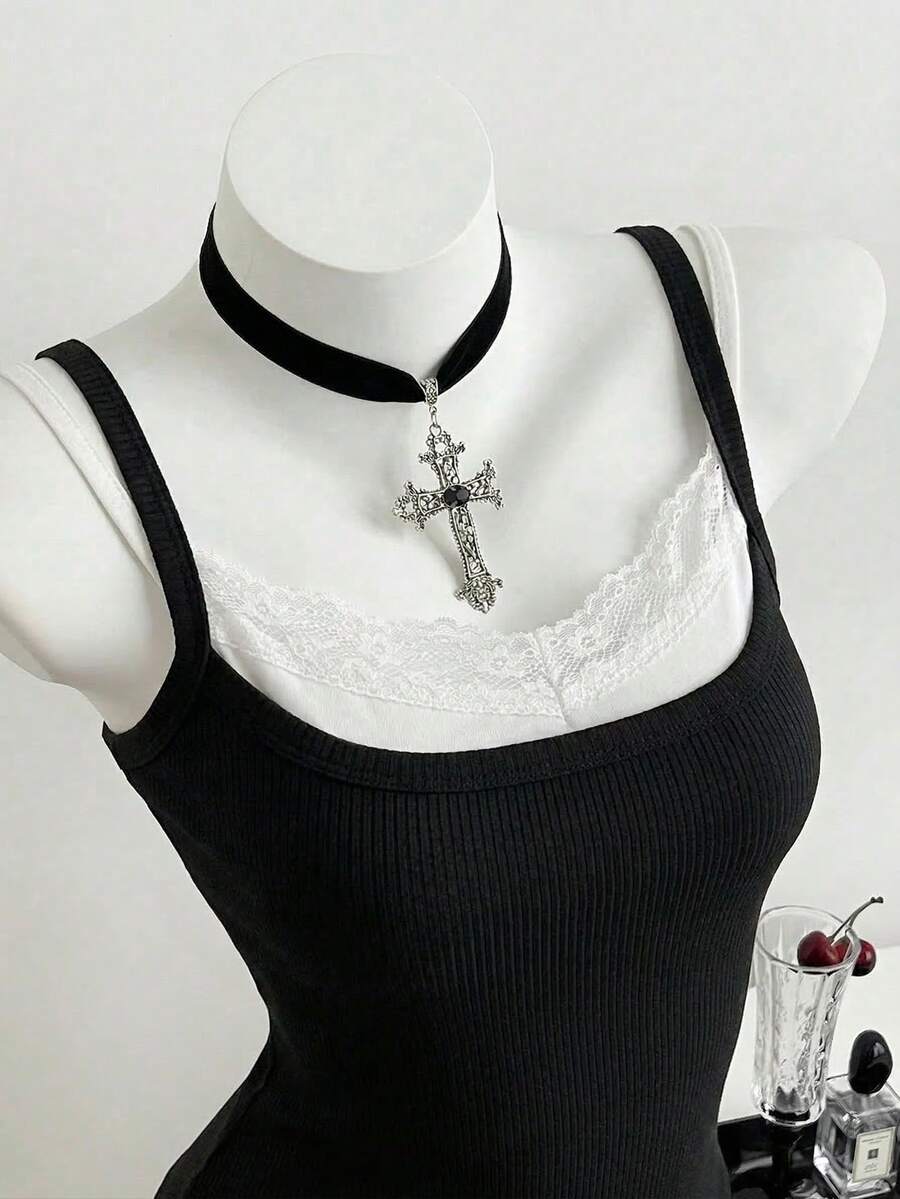 Women's slim fit spaghetti strap cami tank top with contrast lace trim along the neckline