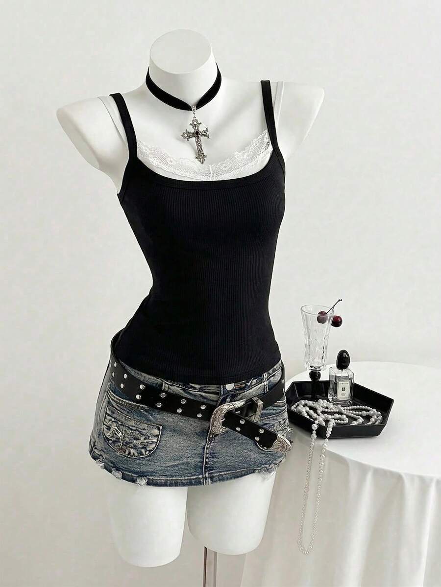 Women's slim fit spaghetti strap cami tank top with contrast lace trim along the neckline