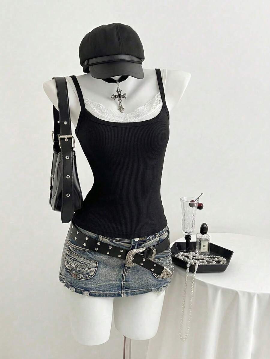 Women's slim fit spaghetti strap cami tank top with contrast lace trim along the neckline