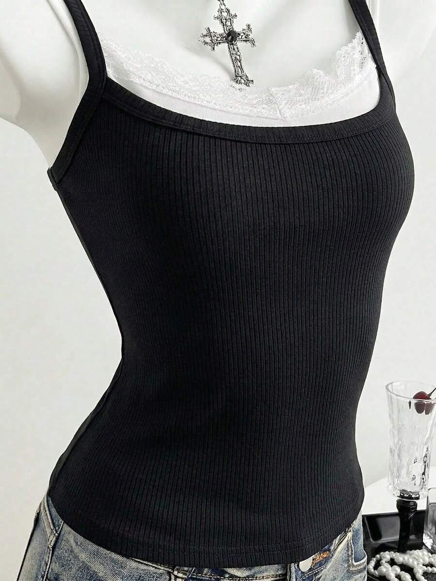 Women's slim fit spaghetti strap cami tank top with contrast lace trim along the neckline