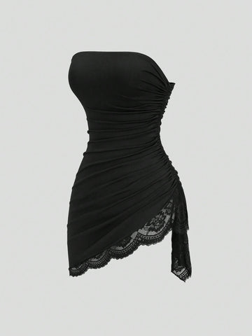 Women's black strapless lace patchwork bodycon mini dress featuring a slim fit design and an asymmetrical hem.