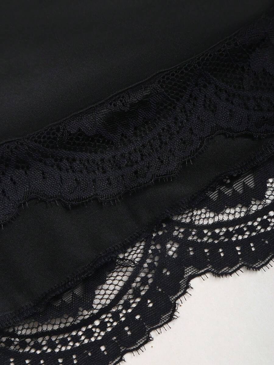 Women's black strapless lace patchwork bodycon mini dress featuring a slim fit design and an asymmetrical hem.