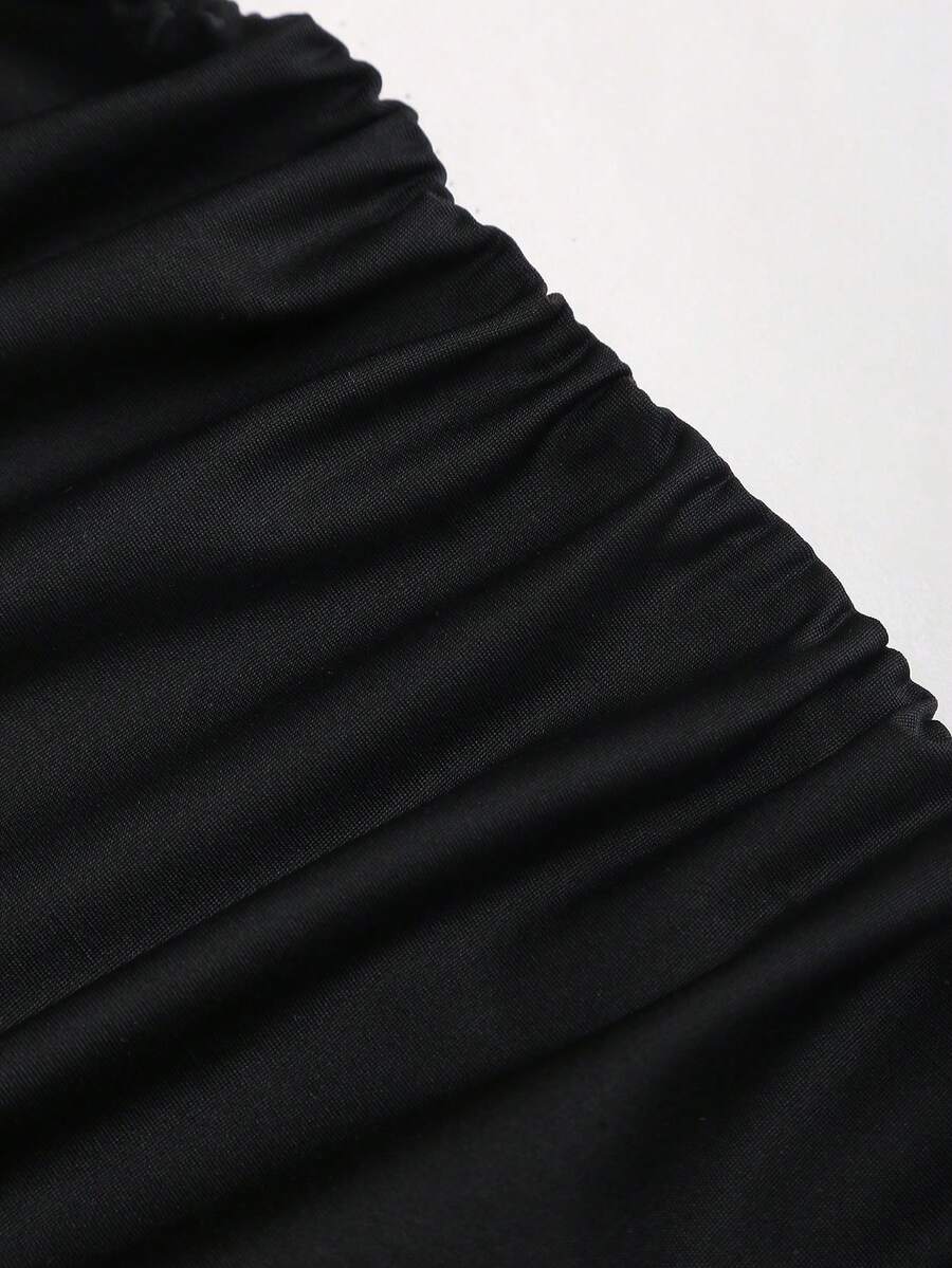 Women's black strapless lace patchwork bodycon mini dress featuring a slim fit design and an asymmetrical hem.