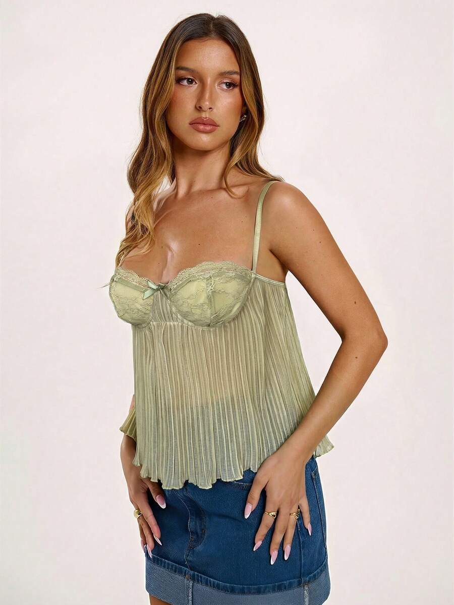 Black slim fit lace camisole corset top featuring lettuce trim flared hem, spaghetti straps, and unlined cup details.